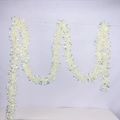 Close-up of iridescent white tinsel garland with a reflective laser finish for festive decor - Iridescent Tinsel / 2m / Light Yellow