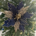 Detail of navy blue Christmas mesh flower with gold glitter edges on pine background - Navy Blue