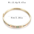Detail of gold-plated hinged bangle with rainbow-colored rectangular zircon stones - Rainbow Hinge Clasp Style (YJC-C-06)