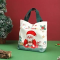 Canvas Christmas gift bag with Santa Claus and reindeer prints and green handles - 26x22x8cm / Canvas Green Handle