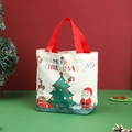 Canvas Christmas gift bag featuring Santa motifs and red handles for holiday treats - 26x22x8cm / Canvas Red Handle