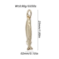 Golden fish pendant charm with cubic zirconia and detailed scale texture for jewelry - Slender Small Fish Pendant (YSN173-02)