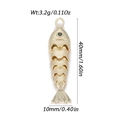 Articulated fish pendant in 14k gold plated copper with green gemstone eye detail - Articulated Gold Overlapping Scale Fish (YSN176-23)