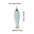 Blue enamel koi fish pendant with gold edging and blue gemstone eye detail, 38mm length - Mint Green Enamel Blue Gem (YSN192-06)
