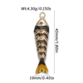 Macro shot of gold-tone fishbone pendant showing exact weight and dimensions - Black Yellow Amber Koi (YSN162-06)