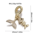 Detail view of golden fish tail and fish bone charms with dimensions 28mm by 25mm - Fish Tail Fishbone Style (DBN167-07)