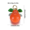 Schattige oranje emaille fruit hanger met groene bladeren voor DIY sieraden maken - Sinaasappel