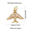 Macro view of 18mm gold plated copper bird pendant with white cubic zirconia and ring loop - Flying Bird Shape (002-04)