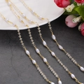 Detail of baroque pearls and transparent beads on a gold-plated stainless steel chain - 1m / Irregular Pearl Cut Bead Chain (4)