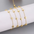 Gold-plated stainless steel star chain for DIY jewelry making displayed on a white stand - 1m / Gold Star Style