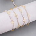 Detail of gold chain necklace featuring white pearls and polished hollow star pendants - Pearl and Star Style (4) / 1m