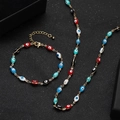 Handmade gold evil eye jewelry set featuring a colorful beaded necklace and bracelet - Exotic Multicolor Evil Eye Necklace and Bracelet Set (9)
