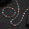Colorful Evil Eye jewelry set with gold-plated necklace and bracelet on black background - Rainbow Enamel Evil Eye Necklace and Bracelet Set (10)