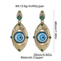 Detail view of gold-plated copper evil eye earrings with colorful zircons and weight data - Radiant Blue Gem Eye (YSE008-7)