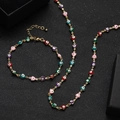 Handmade Evil Eye jewelry set with gold heart charms and colorful enamel on black background - Heart Charm Multicolor Evil Eye Necklace and Bracelet Set (16)