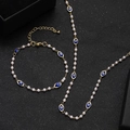 Evil eye jewelry set with golden chain, white pearls and blue charms for women - Blue Evil Eye Artificial Pearl Necklace and Bracelet Set (19)