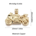 Macro detail of gold motorcycle pendant featuring copper material and CZ stone accents - Gold Sport Motorcycle (100-09)