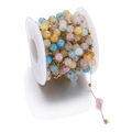 Colorful natural stone beads with golden metal spacers on a white plastic spool - Multicolor 3
