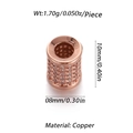 Macro shot of 14k rose gold plated copper bead with heart pattern and zircon inlay - Zirconia Inlaid Cylinder Bead (YSD011-3) / Rose Gold