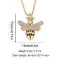 Detailed macro view of gold bee pendant showing dimensions and cubic zirconia inlay - Little Bee Style (XL-420-3) / 14k