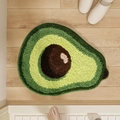 Détail d'un tapis touffeté en forme d'avocat avec texture douce sur sol en bois - 40x60cm / Style Avocat (Half Avocado)