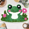 Close-up of soft tufted green frog carpet with pink flowers on white wood surface - Frog Pattern (MJXK94-7)
