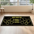 Detail showing the Squat Target Mat with yellow muscle group indicators on wood floor - Yellow Black (Style 05)