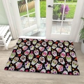 Detail of colorful sugar skull pattern on a diatom mud absorbent door mat on wood floor - 40x60cm / Sugar Skull Mexican Floral