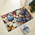 Paillasson rectangulaire 3D galets sur sol en bois clair avec des chaussons - Pierre 3D-2 / 40*60cm