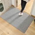 Close-up of gray sisal-style entrance mat texture on wooden floor for hallway - 40x60cm / Grayish White