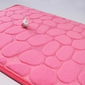 Pink embossed cobblestone coral fleece bath mat with non-slip texture and 3D design - Rose Red
