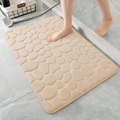 Beige cobblestone embossed coral fleece bathroom mat with anti-slip memory foam texture - Camel