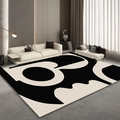 Minimalist black and white geometric area rug in a modern living room setting - Rzy - Minimalist Creamy Style (1)