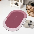 Tapis de bain ovale absorbant avec texte HOME en rouge foncé et rose au design minimaliste - Ovale / Rose Prune / 40*60cm