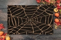Detail of Halloween door mat with golden spider web pattern on dark rustic wood floor - 40x60cm Skin-Friendly Velvet Surface / Halloween Spider Web 6