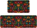 Detail of kitchen floor mats featuring colorful folk floral patterns and stitched edges - Day of the Dead Pattern 11