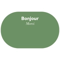Detail view of oval green bath mat featuring Bonjour and Merci printed text - Vintage Green
