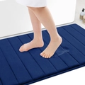 Macro shot of navy blue memory foam bathroom mat with thick vertical stripe texture - 40x60cm / Navy Blue