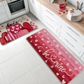 Detail of Valentines kitchen mats set with Love text and heart patterns on wood floor - 1108QRJ-5