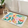 Close-up of floral faux cashmere bath mat texture with colorful abstract plant pattern - Floral-8