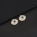Macro detail of gold evil eye pendants featuring blue crystals and sparkling zircons - D721 Dark Blue
