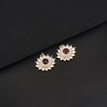 Macro detail of Evil Eye pendant with white enamel and sparkling cubic zirconia stones - D723 Dark Red