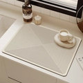 Close-up of absorbent kitchen drying mat with minimalist geometric radial line patterns - 30x40cm / Concentric Square Diffusion (Cream)