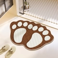 Detailed view of a brown footprint shaped bath mat with plush absorbent fiber texture - Footprints-8 / 40*60cm (Skin-friendly Velvet)