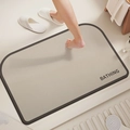 Detailed close-up of a minimalist beige diatom mud bath mat with gray non-slip edging - Minimalist Semi-Arch-10