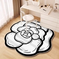 Detailed view of camellia shaped rug with bold black outlines on light wooden floors - Irregular Rose Type 5 / 40*40cm (Skin-friendly Fleece)