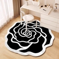 Detailed close-up of a camellia shaped black and white non-slip diatom mud floor mat - Alien Rose-7 / 40*40cm (Skin-friendly Fleece)