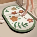 Close-up of cream oval diatom mud bath mat featuring green forest edges and flower patterns - Straight Edge Round - Hualu Skin-Friendly Velvet / Beige and Green / 40x60cm