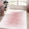 Detalle de alfombra con degradado rosa y blanco y textura desgastada en hogar moderno - Rosa Blanco Estilo Desgastado Dos / Compacto