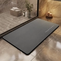 Detailed view of dark grey diatomite bath mat with elegant English text in luxury bathroom - Simple Gray / 40*60cm (Skin-friendly Velvet)